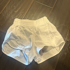 white Hotty Hots from lululemon they are a size 2 length 2.5 barley worne